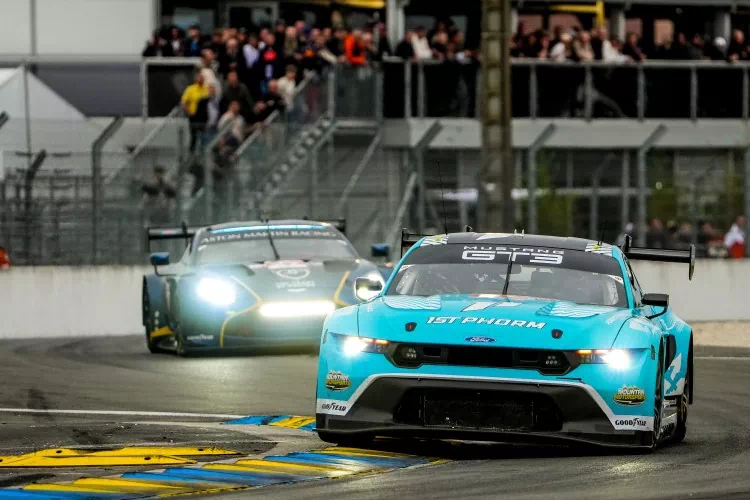 #77 Proton Competition Ford Mustang LMGT3, closely followed